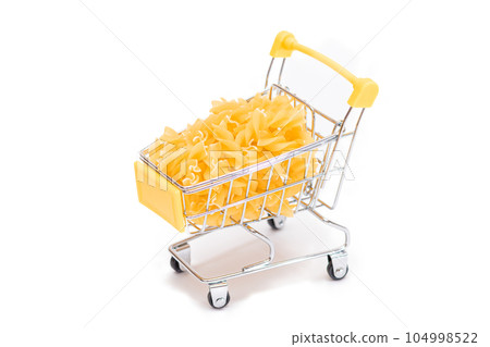 Uncooked Fusilli Pasta in Small Shopping Cart Isolated on White 104998522