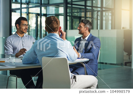 Business people, meeting and discussion for corporate idea strategy, building or late at the office. Group of employee workers in business meeting, team planning or collaboration at the workplace 104998579