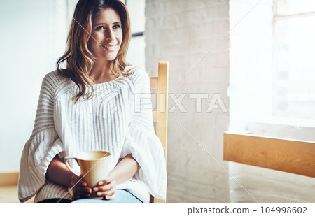 Coffee, thinking and woman relax at home, happy and content while daydreaming on wall background. Tea, contemplation and female enjoying a quiet morning, calm and peaceful at living room window Coffee, thinking and woman relax at home, happy and content while daydreaming on wall background. Tea, contemplation and female enjoying a quiet morning, calm and peaceful at living room window 104998602