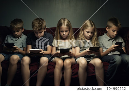 Several children are sitting buried in smartphones and ignoring each other. Several children are sitting buried in smartphones and ignoring each other. 104999212