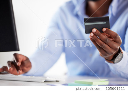 Hand, black man and typing with credit card, office and online shopping with password, discount and payment. African customer, cyber security and e commerce with desktop, pc and fintech in workplace 105001211
