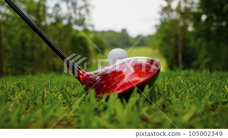 Golf ball and golf club in beautiful golf course at Thailand. 105002349