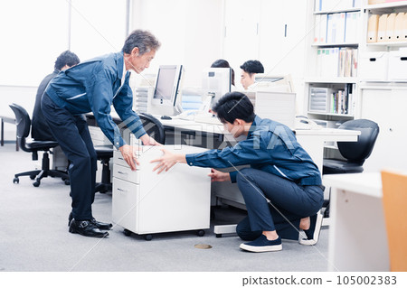 Work staff carrying office furniture Work staff carrying office furniture 105002383
