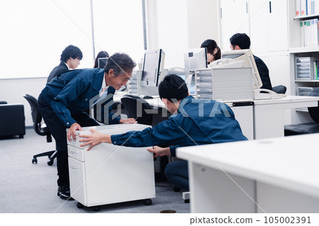 Work staff carrying office furniture Work staff carrying office furniture 105002391