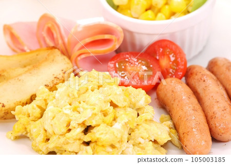 Morning breakfast wiener scrambled eggs tomato ham salad 105003185