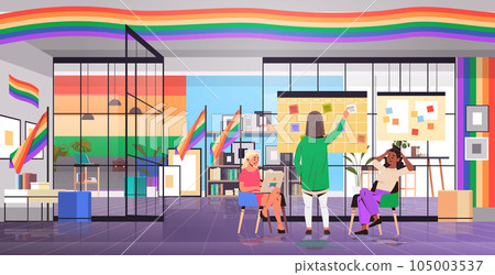 mix race girls in colorful clothes working in office lgbt rainbow flag transgender love generation Z concept 105003537