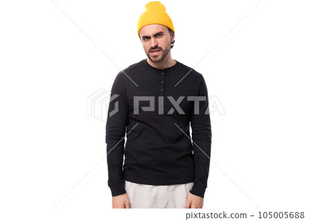 portrait of a young 30s authentic brunette male adult in a black sweater on a white background with 105005688