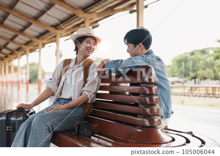 Asian couple at railway station have happy moment. Tourism and travel in the summer 105006044