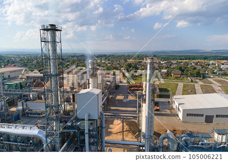 Aerial view of wood processing factory with stacks of lumber at plant manufacturing yard. 105006221