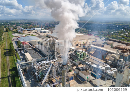Aerial view of oil and gas refining petrochemical factory with high refinery plant manufacture structure. Global production and manufacturing concept. 105006369