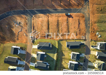 Aerial view of construction site with new tightly packed homes in South Carolina. Family houses as example of real estate development in american suburbs 105006514