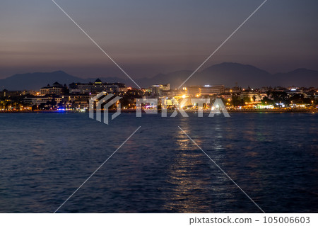 Night city. Alanya, Turkey. Beautiful lights of night city. View of Alanya harbor form Alanya peninsula. Turkish Riviera by night. Night city. Alanya, Turkey. Beautiful lights of night city. View of Alanya harbor form Alanya peninsula. Turkish Riviera by night. 105006603