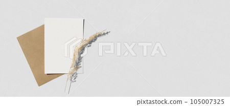 Blank greeting card, invitation mockup. Dry grass, pampas plant on white table background. Flat lay, top view. Copyspace. Blank paper cards, mock up. Modern Minimal business brand template. A6 Blank greeting card, invitation mockup. Dry grass, pampas plant on white table background. Flat lay, top view. Copyspace. Blank paper cards, mock up. Modern Minimal business brand template. A6 105007325
