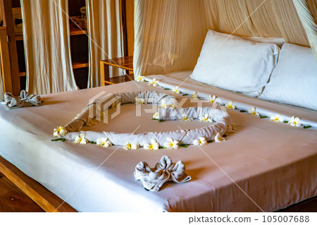 Bedroom inside a cabin on the beach in Haad Tien Beach in shark bay, koh Tao, Thailand Bedroom inside a cabin on the beach in Haad Tien Beach in shark bay, koh Tao, Thailand 105007688