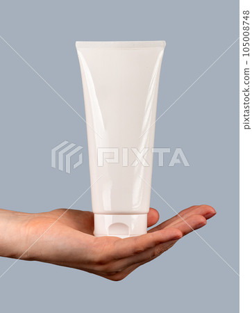 Cream tube mockup, blank cosmetic product, face care, cleansing gel package on hand palm 105008748
