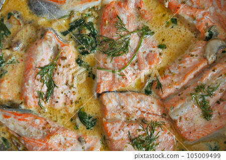 baked salmon fish in a large bowl baked salmon fish in a large bowl 105009499