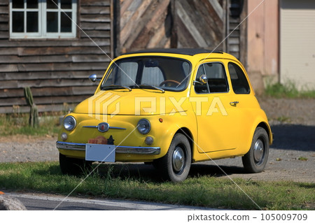 Image of a yellow Italian car Image of a yellow Italian car 105009709
