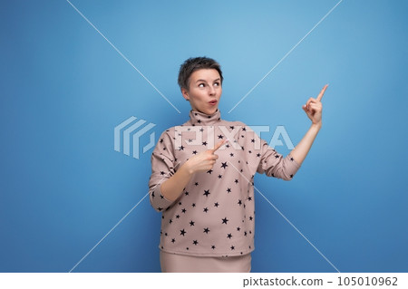 positive inspired young career woman with gray streaked hair dressed in a skirt and blouse 105010962