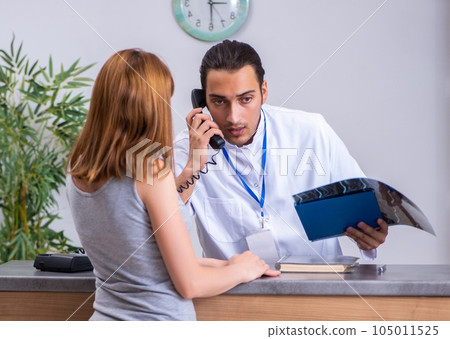 Young patient at the reception in the hospital Young patient at the reception in the hospital 105011525