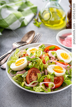 Spring vegetable salad with boiled eggs 105012389