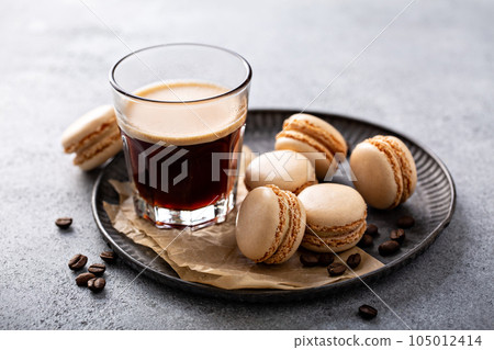 Coffee or chocolate macarons on a tray Coffee or chocolate macarons on a tray 105012414