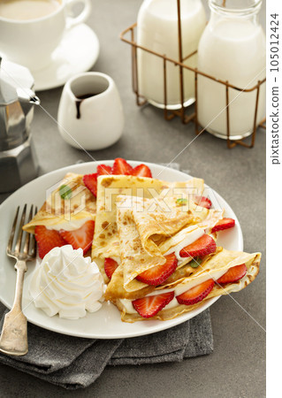 Thin crepes with berries 105012424