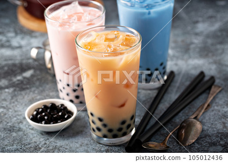 Variety of milk bubble tea in tall glasses Variety of milk bubble tea in tall glasses 105012436