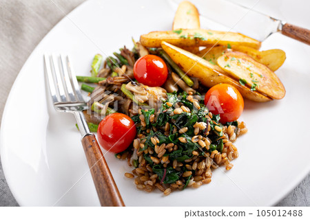 Healthy vegan dish with potatoes Healthy vegan dish with potatoes 105012488