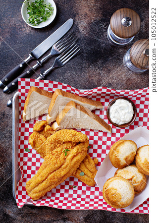 Fried catfish with cornbread Fried catfish with cornbread 105012522