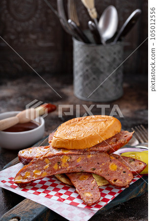 Sandwich with cheesy sausage links Sandwich with cheesy sausage links 105012556