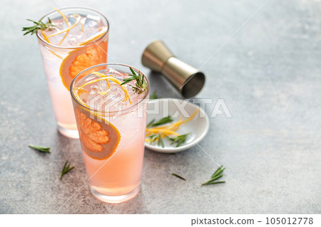 Cold and refreshing summer grapefruit cocktail Cold and refreshing summer grapefruit cocktail 105012778