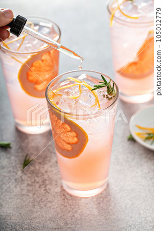 Grapefruit cocktail with rosemary with bitters 105012779