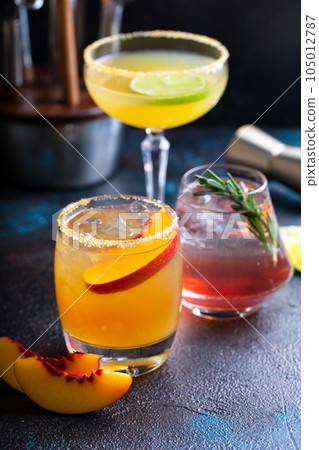 Variety of summer cocktails on dark background 105012787