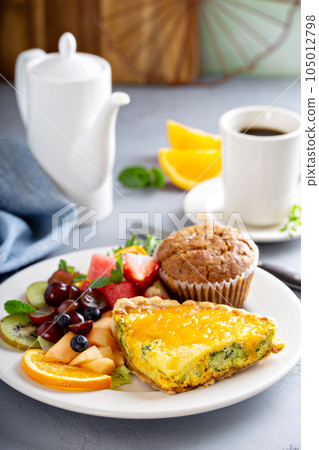 Healthy and filling breakfast with quiche 105012798