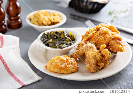 Southern fried chicken with collard greens 105012824