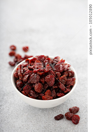 Dried cherries in a white bowl 105012890