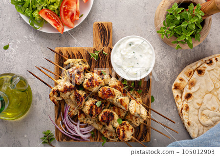 Greek chicken souvlaki with tzatziki Greek chicken souvlaki with tzatziki 105012903