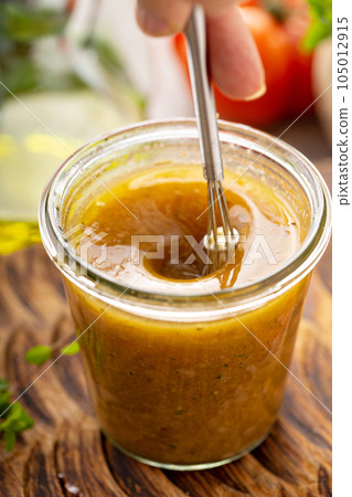 Homemade vinaigrette salad dressing Homemade vinaigrette salad dressing 105012915