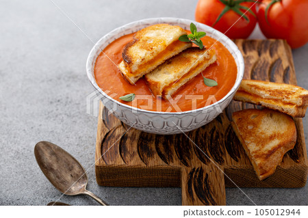 Cream of tomato soup with grilled cheese 105012944