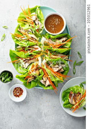 Asian grilled chicken ginger lettuce wraps Asian grilled chicken ginger lettuce wraps 105012961