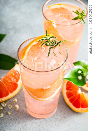 Cold and refreshing summer grapefruit cocktail Cold and refreshing summer grapefruit cocktail 105012992
