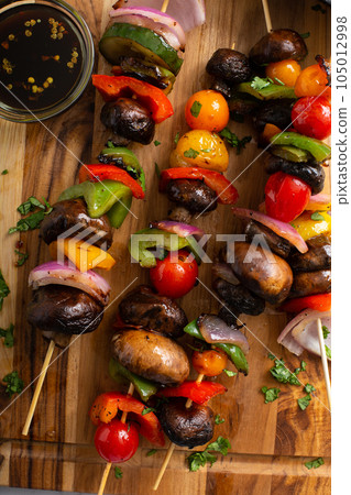 Vegan vegetable and mushroom grilled cabobs Vegan vegetable and mushroom grilled cabobs 105012998