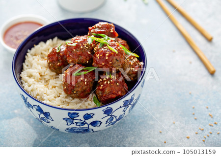 Asian meatballs with sweet and sour sauce 105013159