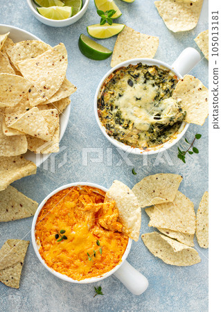 Artichoke spinach and buffalo chicken dips with chips Artichoke spinach and buffalo chicken dips with chips 105013181