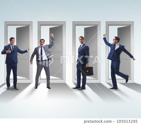 Businessman in uncertainty concept with many doors 105013295