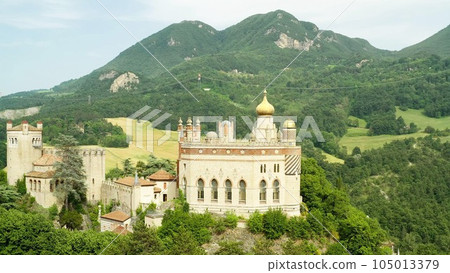 Aerial drone panoramic view of the Rocchetta Mattei castle in Italy on sunny summer day, view from above. High quality footage 105013379