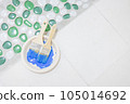 brush with blue paint 105014692