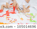 child playing with paint 105014696