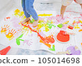 child playing with paint 105014698