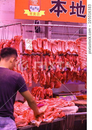 Pork sold at a butcher shop in the Hong Kong market. Higher and more expensive than beef and chicken. Chinese love pork Pork sold at a butcher shop in the Hong Kong market. Higher and more expensive than beef and chicken. Chinese love pork 105016383